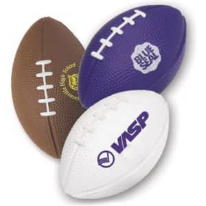 A set of three rugby-shaped stress relievers in brown, purple, and white, featuring different logos.