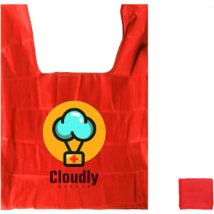 A red reusable foldaway shopping bag featuring a logo with a cloud and cross design.
