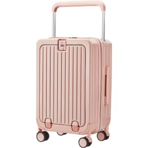 A hardside suitcase in pale pink, featuring a textured surface, retractable handle, and four wheels for easy movement.