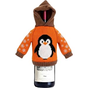 A drink bottle covered with a customisable knitted wine bottle cover featuring a penguin design and a brown hood.