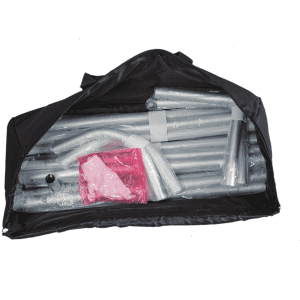 A black bag containing folded metal poles and accessories for a tension fabric display wall.