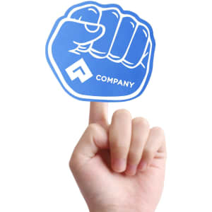 A blue foam mitt shaped like a fist held by a hand, featuring a logo on the palm side.