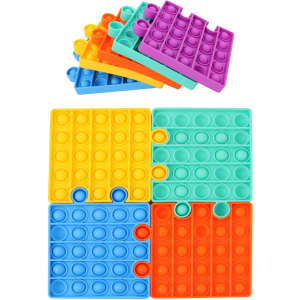 Puzzle Shape Pop It fidget toy featuring vibrant colours: purple, orange, teal, and blue in a stack and arranged layout.