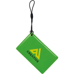 A green NFC epoxy square tag with a black strap and a logo displayed prominently on its surface.