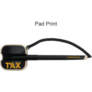 A black and gold pen with a unique square-shaped top and a cord attached. The pen features a logo.