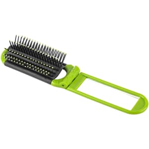 A folding hair brush with a mirror, featuring a black and green design. The brush has flexible bristles and a compact handle.