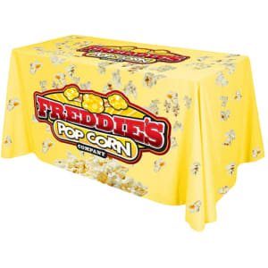 A yellow 4-sided throw table cloth featuring popcorn graphics and a logo. Suitable for an 8ft table.