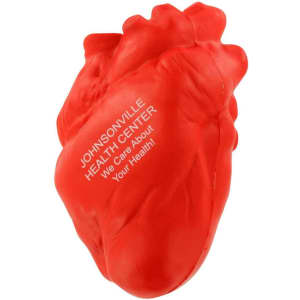 A small red heart-shaped stress reliever with a logo. It has a textured surface for squeezing.