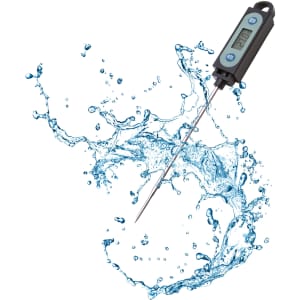 A digital meat thermometer with a long stainless steel probe, featuring a black casing and a splash of water.