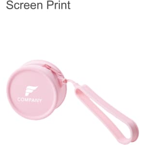 A round pink silicone coin pouch with a zipper and a wrist strap, featuring a logo.