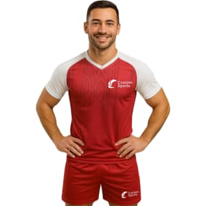 A red and white polyester micro mesh V-neck raglan sport tee shirt with a logo.