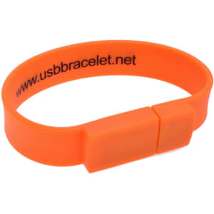 An orange rectangular silicone wristband flash drive, featuring a circular clasp and a logo on the inner band.