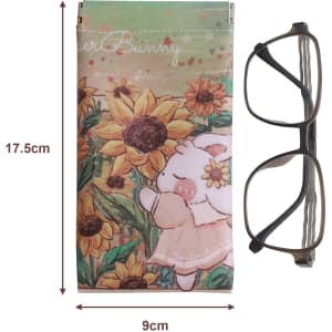 A full colour printed glasses pouch featuring a floral design, alongside a pair of glasses for scale.