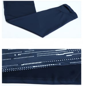 A navy polyester spandex raglan jacket featuring a stand-up collar and quarter-zip design, with a patterned detail.