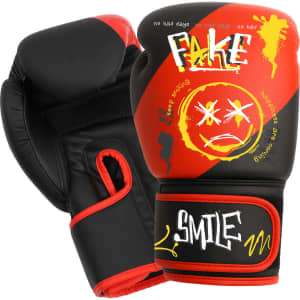 Kids boxing gloves in black and red with vibrant graphic designs and a logo on the strap.