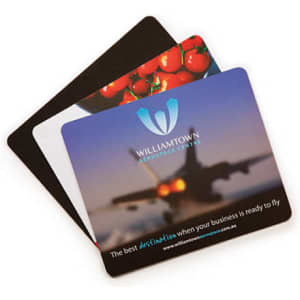 A set of three mouse mats featuring various designs, including a logo, in black, white, and a colourful image.