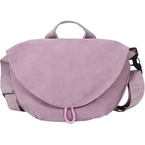 A pink casual crossbody bag with a flap closure and an adjustable strap, featuring a logo.