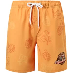 Orange men's swim shorts featuring a leaf pattern and a logo, made from polyester and spandex.
