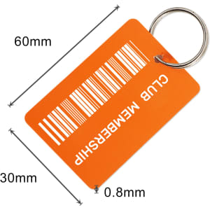 An orange custom plastic key tag with a keyring and a barcode design. Dimensions are 60mm by 30mm.