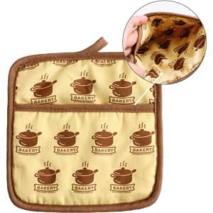 A large quilted pot holder in yellow with brown bakery-themed print and a brown trim, featuring a patterned interior.