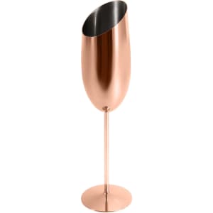 A stainless steel slanted champagne flute in a rose gold finish with a sleek design and circular base.