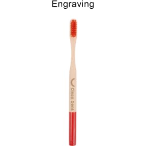 A bamboo toothbrush with a large round handle featuring red accents and a logo.
