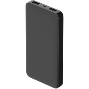 A black power bank with dual USB ports and a sleek, smooth design. It features a logo on the surface.