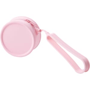 A round pink silicone coin pouch with a zip and a wrist strap. It features a simple design and a branding logo.