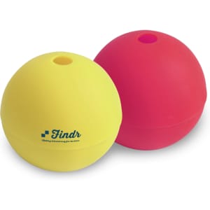 Two silicone whisky ice ball moulds, one yellow and one red, featuring a logo on the yellow mould.