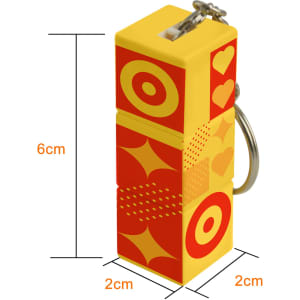 A yellow and red custom square cube with keyrings, featuring geometric patterns and a metal attachment. Dimensions are 6cm x 2cm x 2cm.