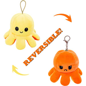 A small, reversible plush octopus toy in yellow and orange, featuring a keychain for attachment.