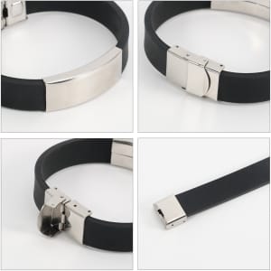 An engraved stainless steel buckle latch bracelet with a black rubber band and polished silver-tone accents. Features a logo.