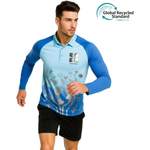 A man is wearing a blue and light blue long-sleeved polo shirt with a logo and a printed design.