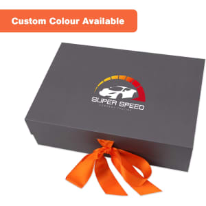 A grey foldable magnetic box featuring an orange ribbon and a logo on the top. Custom colour options are available.