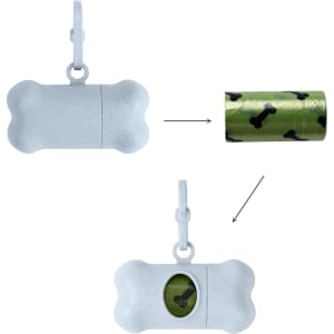A bone-shaped grey pet waste bag dispenser with a roll of green bags featuring black bone patterns inside.