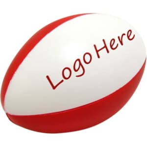 A red and white stress ball in the shape of a rugby ball, featuring a logo on one side.