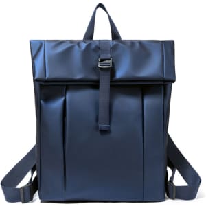 A navy blue tarpaulin roll top backpack with adjustable shoulder straps and a front buckle closure.
