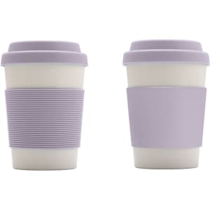 A bamboo fibre coffee cup in lilac with a silicone lid and grip, featuring a logo on the side. Two cups are displayed.