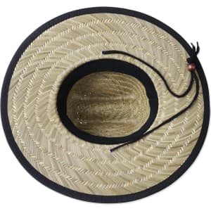 A straw hat with a wide brim, featuring a black trim and a string detail. It has a natural beige colour.