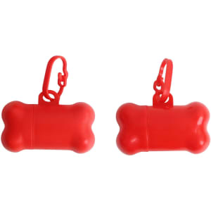A red bone-shaped pet wastebag dispenser with a clip attached. Two dispensers are displayed.