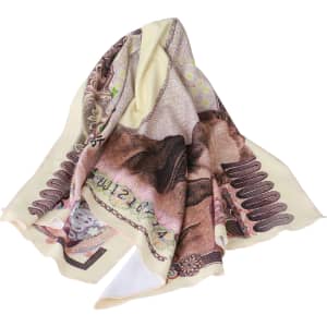 A beach towel featuring a colourful design with shades of beige and brown, displaying a logo.