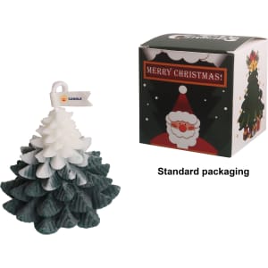 A Christmas tree-shaped candle in white and green, alongside festive packaging featuring Santa Claus.