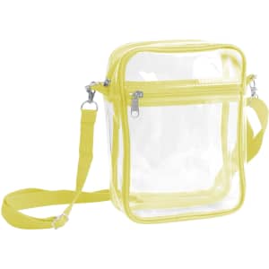A clear tote bag with a zipper closure, featuring a yellow strap and trim. It has a transparent main compartment.