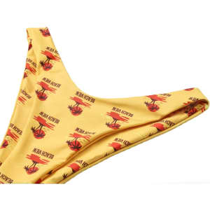 A yellow bikini bottom featuring a repeating pattern, with a branded logo displayed prominently.