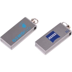 A metallic grey flash drive with a loop for attachment, featuring two distinct logos on its surface.