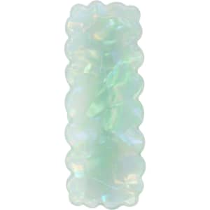 An iridescent hair clip in a wavy rectangle shape, featuring shades of pale green and blue. It has a glossy finish.
