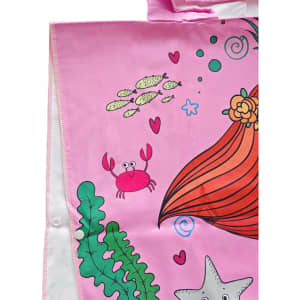A pink hooded change towel featuring colourful marine illustrations, including a crab and seaweed designs.