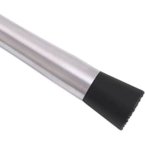 A long stainless steel cocktail muddler with a black rubber end, designed for mixing and preparing beverages.
