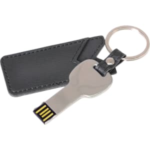 A silver key-shaped flash drive attached to a black leather pouch with a keyring.