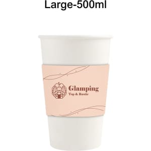 A 500ml white compostable paper cup with a light pink cup sleeve featuring a logo.